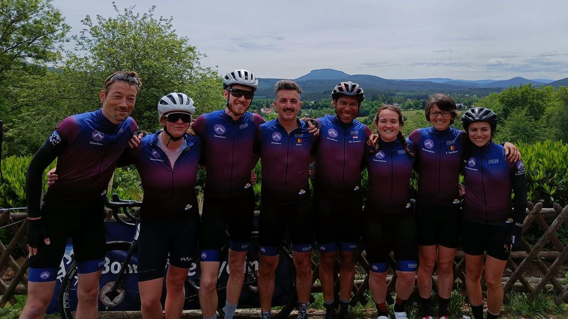 Members of the three racing teams posing for a picture in the Vosges