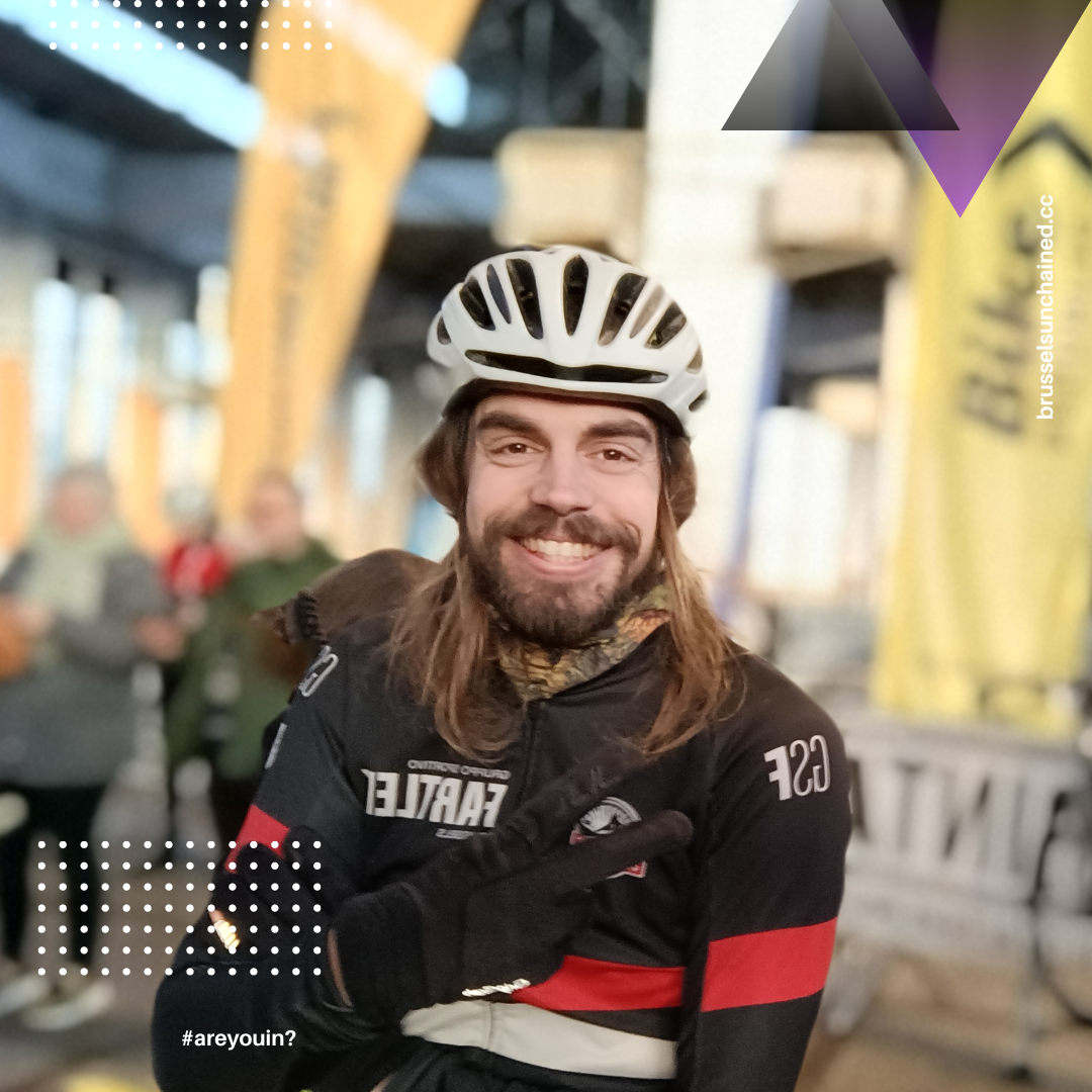 Portrait of Pieter smiling at the start of Omloop Het Nieuwsblad 2023 Cyclo