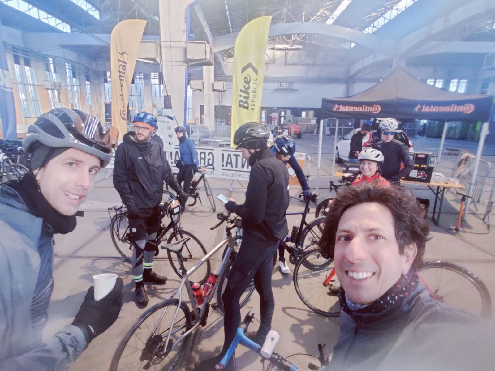 Roberto selfie with riding crew at the start of Omloop Het Nieuwsblad 2023