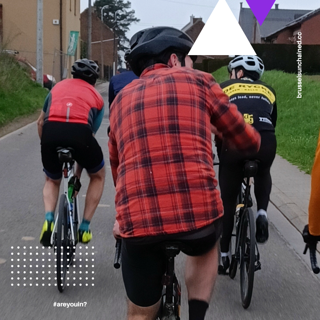 Group of cyclists riding in peloton formation