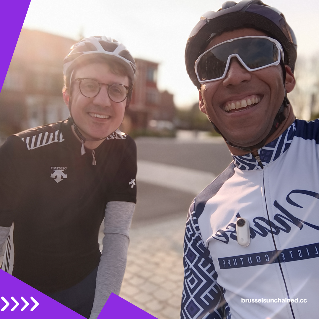 Two cyclists smiling at the camera