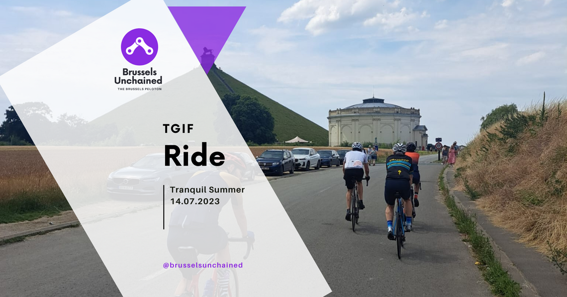 Group of cyclists riding alongside the Butte de Waterloo